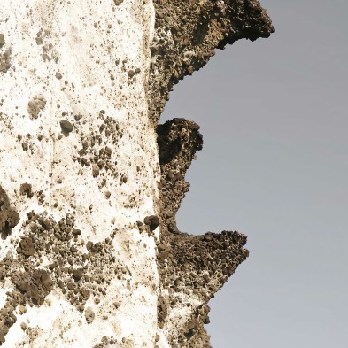 Photographic poster on textured eco-friendly wallpaper the Cliff Cala Chica in the Cabo de Gata Níjar Park, color. vertical.
