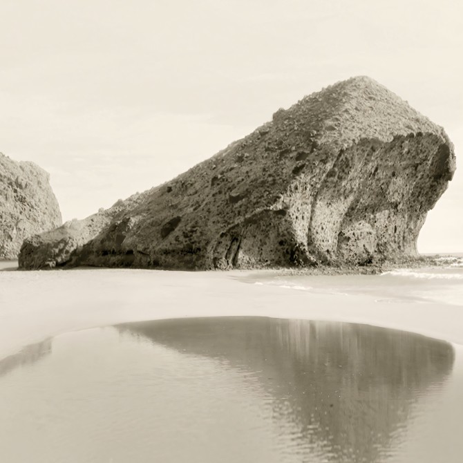 Photographic poster on textured eco-friendly wallpaper of Mónsul beach in the Cabo de Gata Natural Park, Almería. Sepia tone.