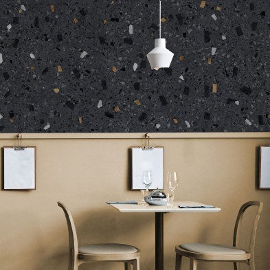 Terrazo Liceo - vinilo Lokoloko lavable y autoadhesivo para paredes de locales en color gris oscuro y pequeños tonos tierra.