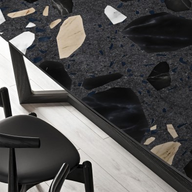 Terrazo Correr. Vinilo lavable para mesas y superficies. En color gris oscuro con piedras negras, blancas y tierra. Lokoloko
