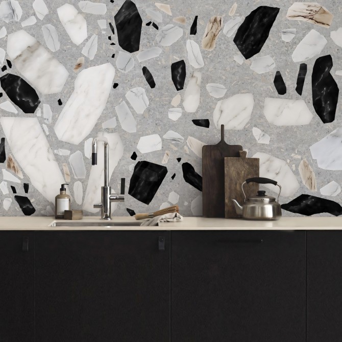 Terrazo Celestia- Vinilo lavable para paredes y azulejos en cocinas, con piedras en blanco, negro y tierra, sobre un fondo gris.