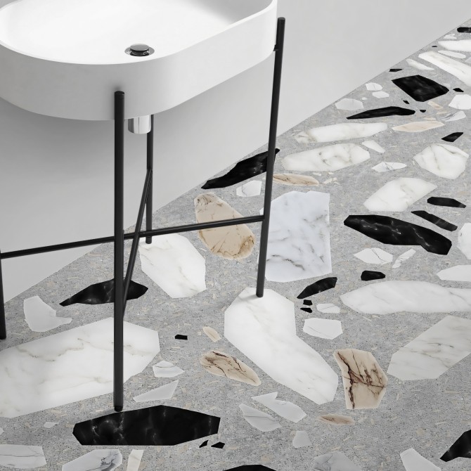 Terrazo Celestia- Vinilo lavable para suelo, en baño o cocinas, con piedras en blanco, negro y tierra, sobre un fondo gris.