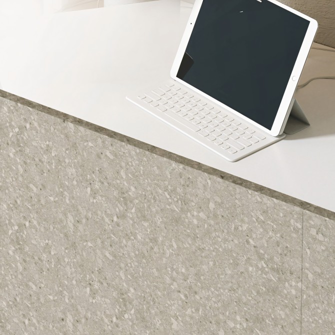 Terrazzo Escarpment vinyl for living room furniture. Fireproof, water-resistant, and resistant to cleaning products.
