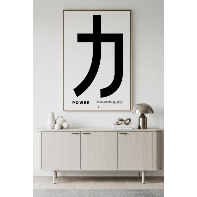 Black and white typographic print in a modern and sober living room.