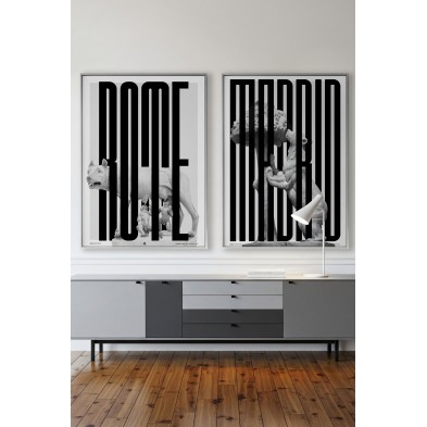 Poster of Rome with black lettering over classical sculpture in a contemporary living room.